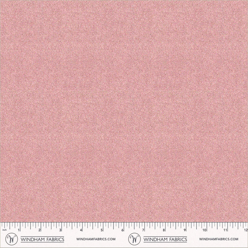 Rose gold fabric with a ruler at the bottom for scale, branded 'Windham Fabrics'.