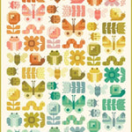Pattern of colorful insects, flowers, and animals on a white background
