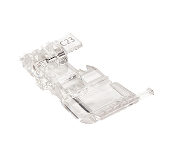 Clear plastic presser foot for sewing curves on a Bernina overlock or cover stitch
