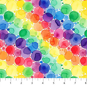 Colorful watercolor dot pattern on a fabric swatch