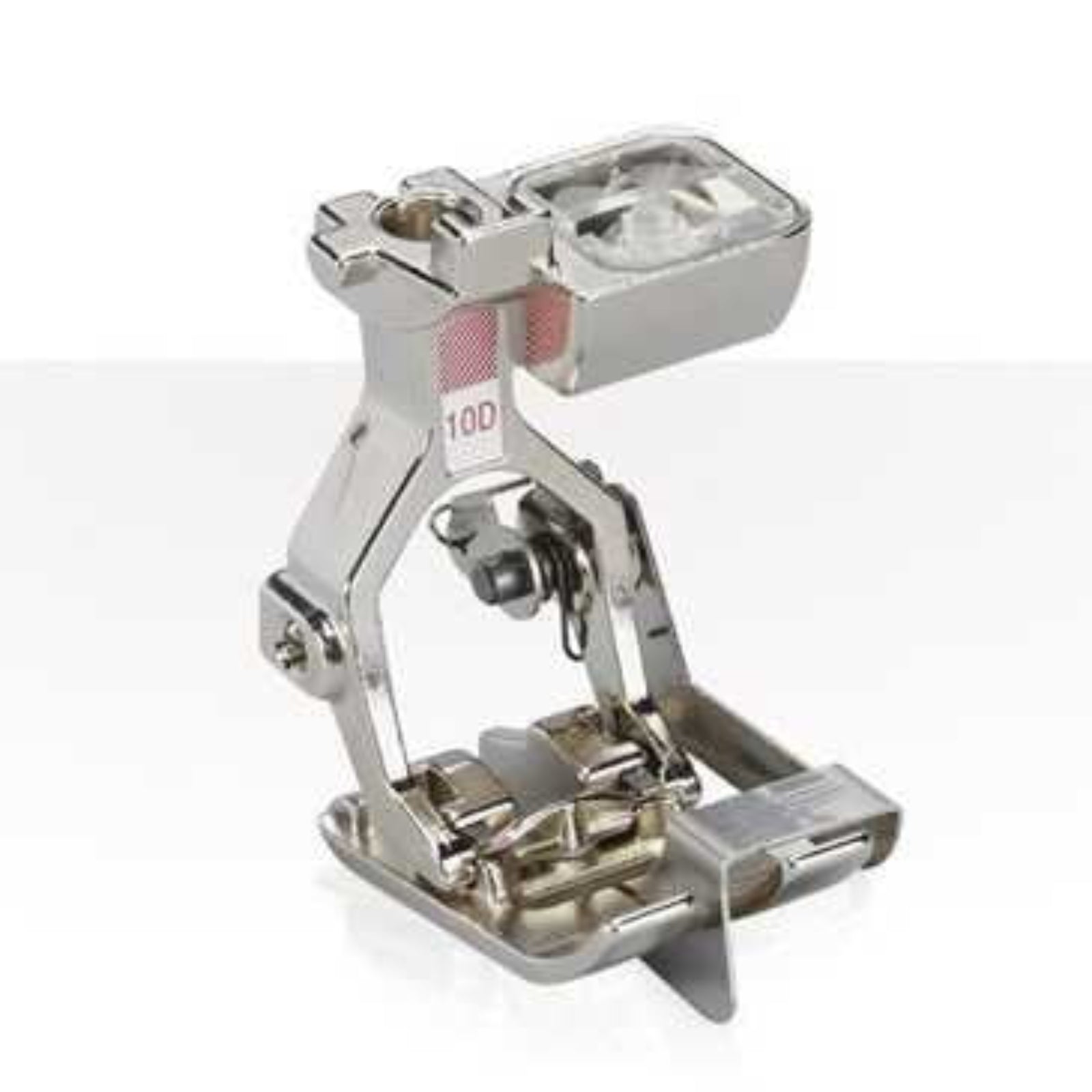 Metal sewing machine foot on a white background