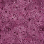 A close-up of a fabric or material swatch with a mottled magenta and purple background and an allover pattern of dark purple stars, sparkles, and burst-like radial marks.