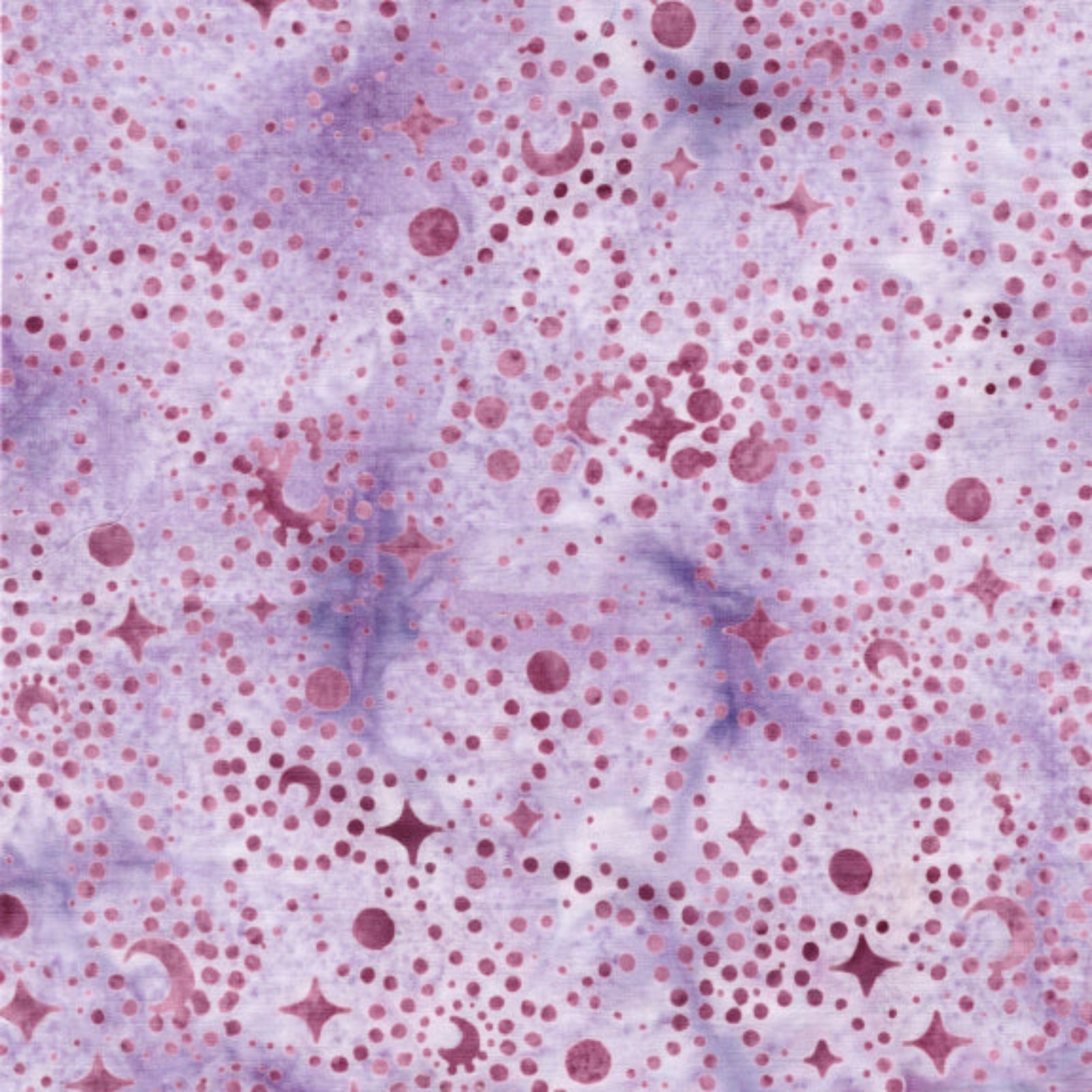 Patterned fabric with pink and purple dots and shapes on a textured background