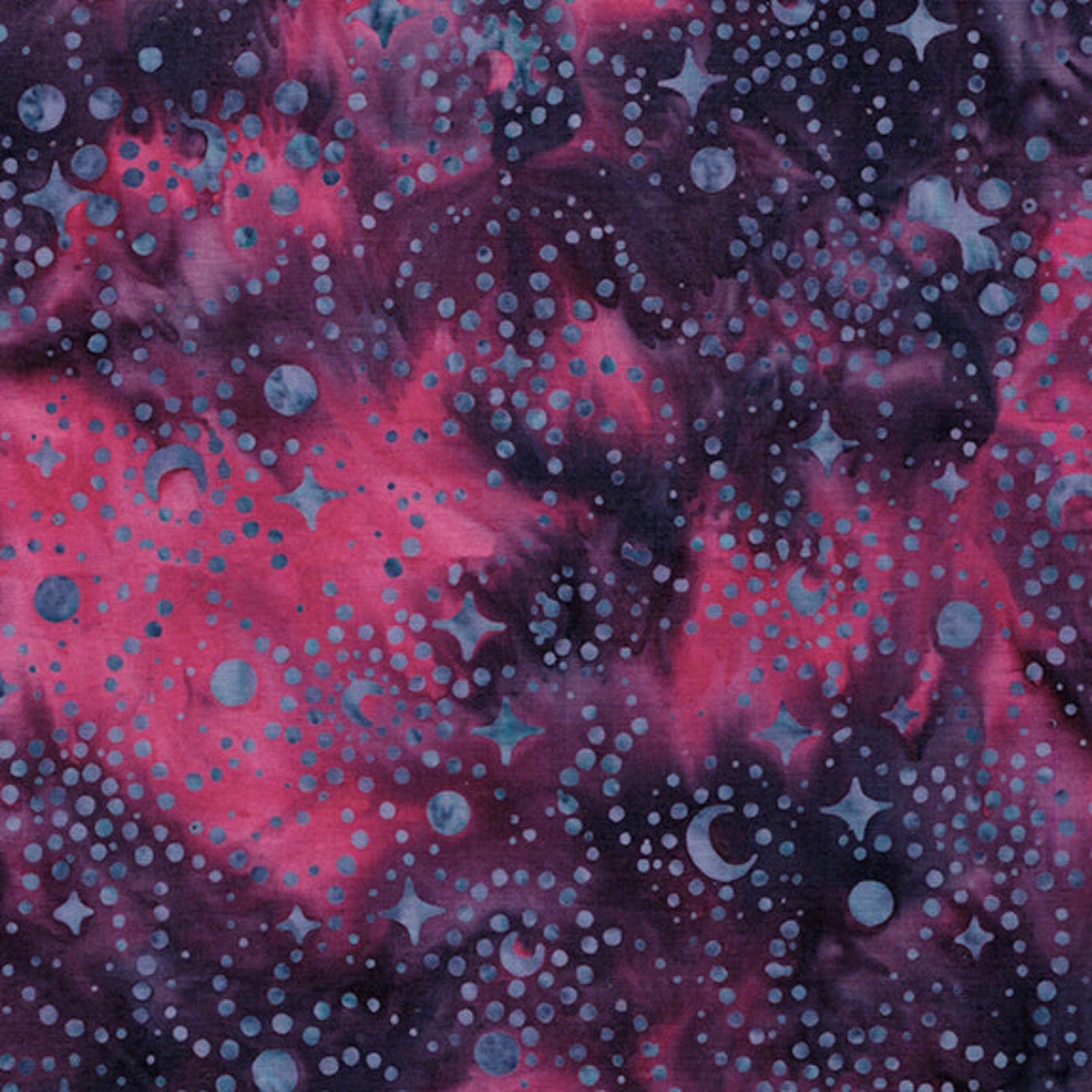 A close-up of a fabric pattern featuring a cosmic galaxy design with pink and deep purple nebulae, dotted with small blue stars and planets.