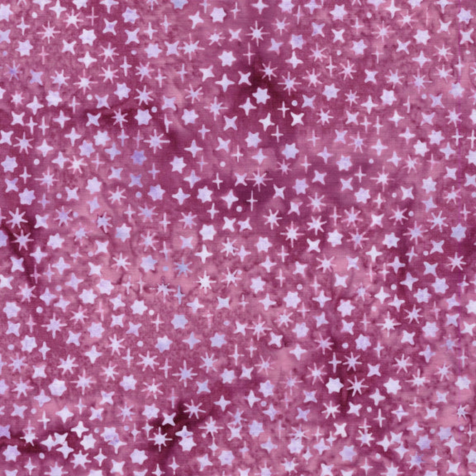 Pink fabric with small star patterns