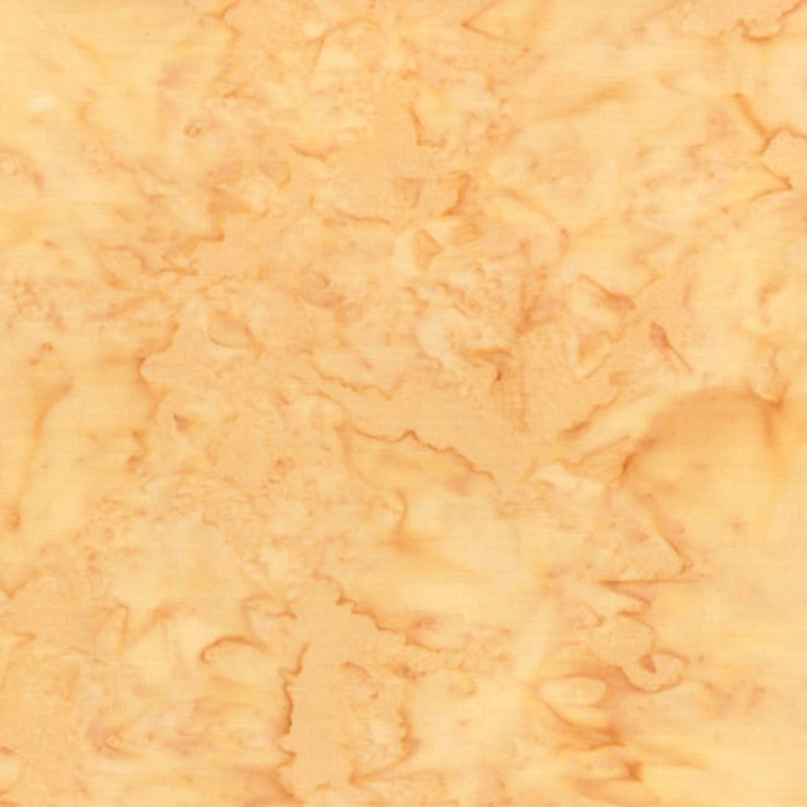 Close-up of a textured peach-colored fabric
