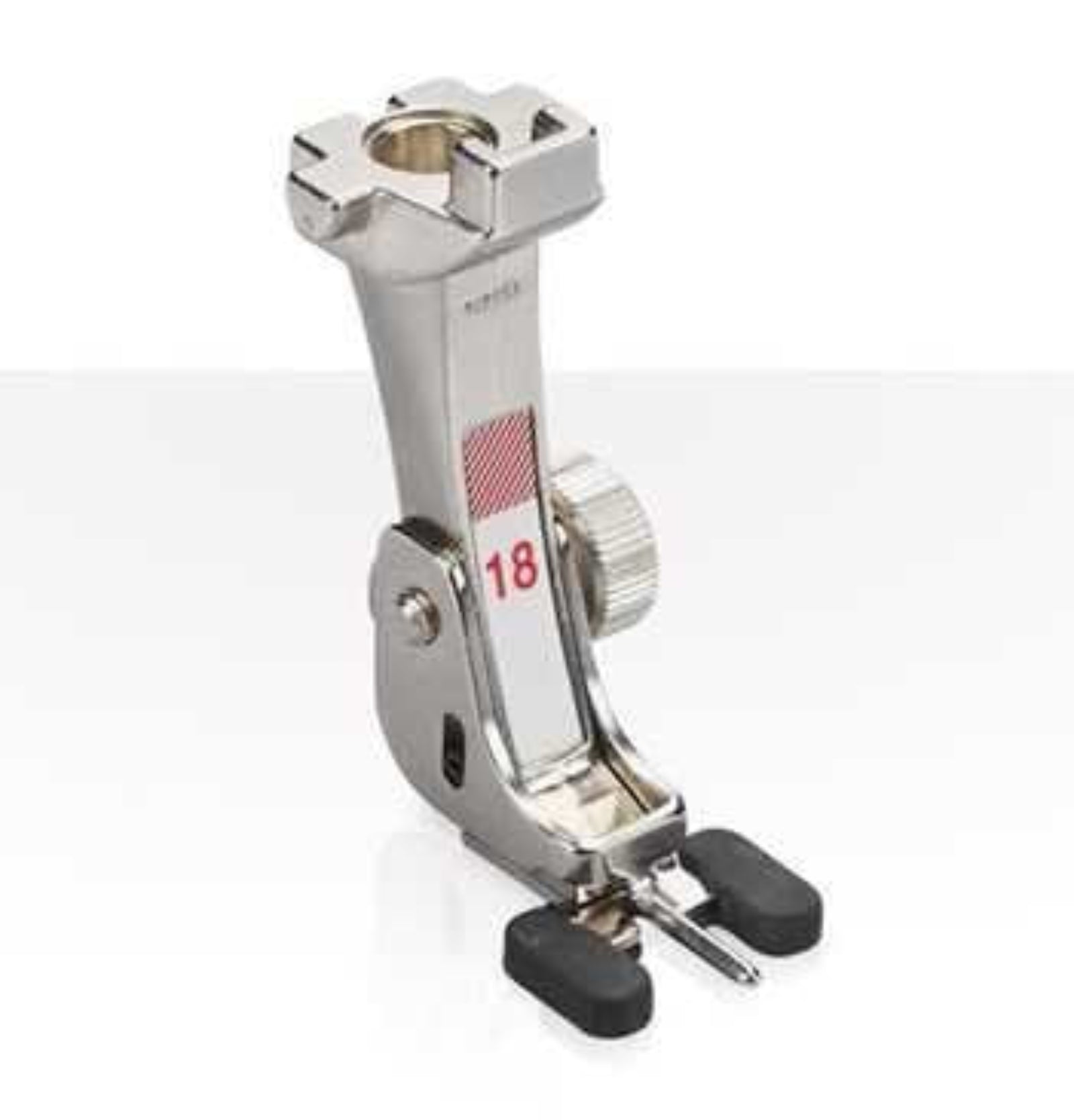 Metal sewing machine presser foot on a white background