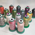 A collection of 15 spools of sewing thread in various colors