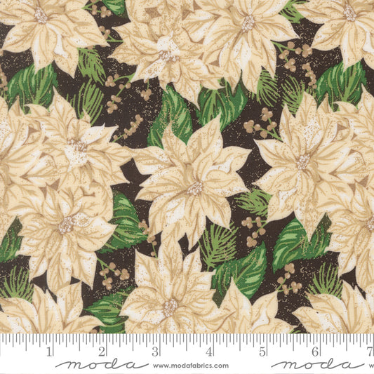 Pattern of beige poinsettias and green leaves on a black background with a ruler for scale.