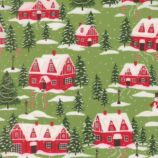 Pattern of red houses, green trees, and candy canes on a green background