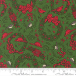 Christmas-themed fabric pattern with red bows, birds, and wreaths on a green background, featuring a ruler for scale.