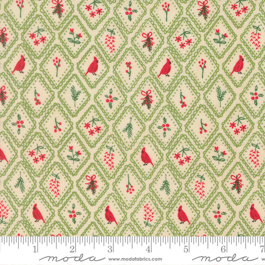 Christmas-themed fabric pattern with red birds, green bows, and red berries on a beige background, featuring a ruler for scale.