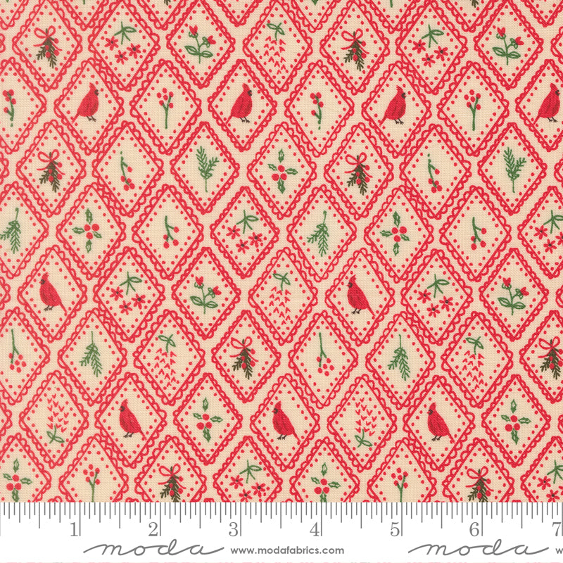 Christmas-themed fabric pattern with red birds, green holly leaves, and red diamonds on a beige background, featuring a ruler for scale.