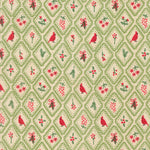 Patterned fabric with red birds, green leaves, and red berries on a beige background.