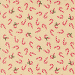 Pattern of red and white candy canes with green leaves on a beige background