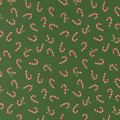 Pattern of candy canes on a green background