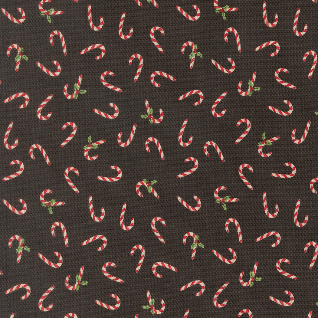 Pattern of candy canes on a black background