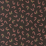 Pattern of candy canes on a black background