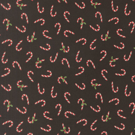 Pattern of candy canes on a black background