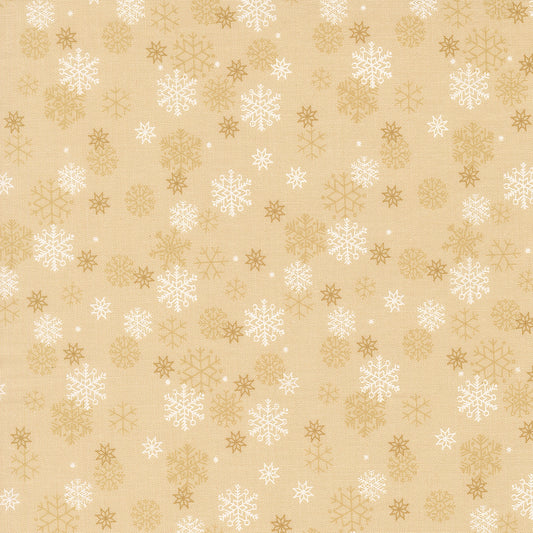 Pattern of white snowflakes and gold stars on a beige background