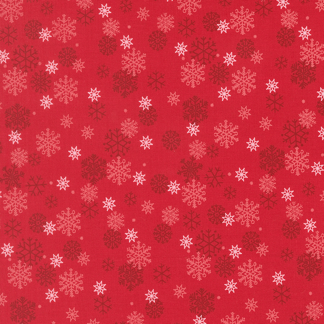 Pattern of snowflakes on a red background