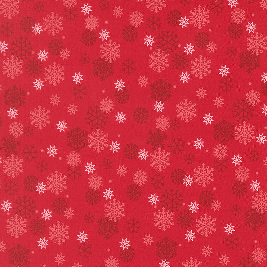 Pattern of snowflakes on a red background