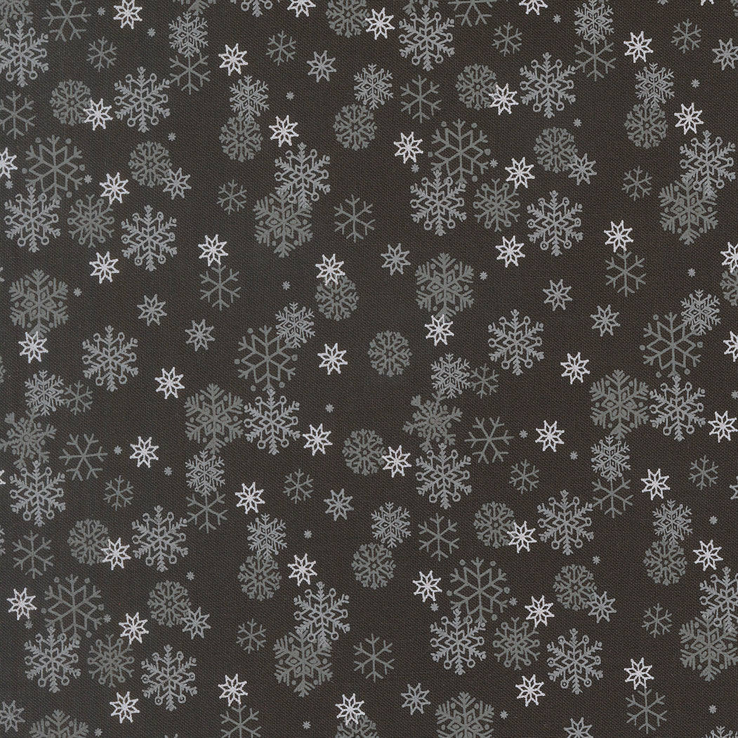 Pattern of snowflakes on a dark background