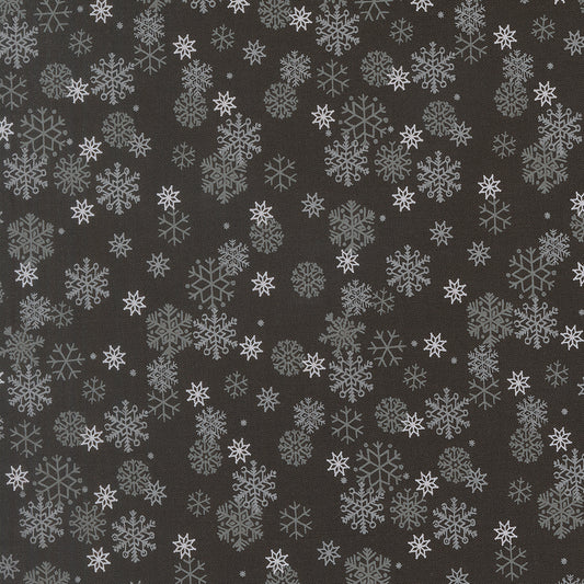 Pattern of snowflakes on a dark background