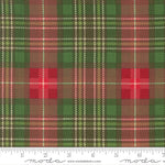 Plaid fabric pattern with red, green, and brown colors, featuring a ruler at the bottom for scale.