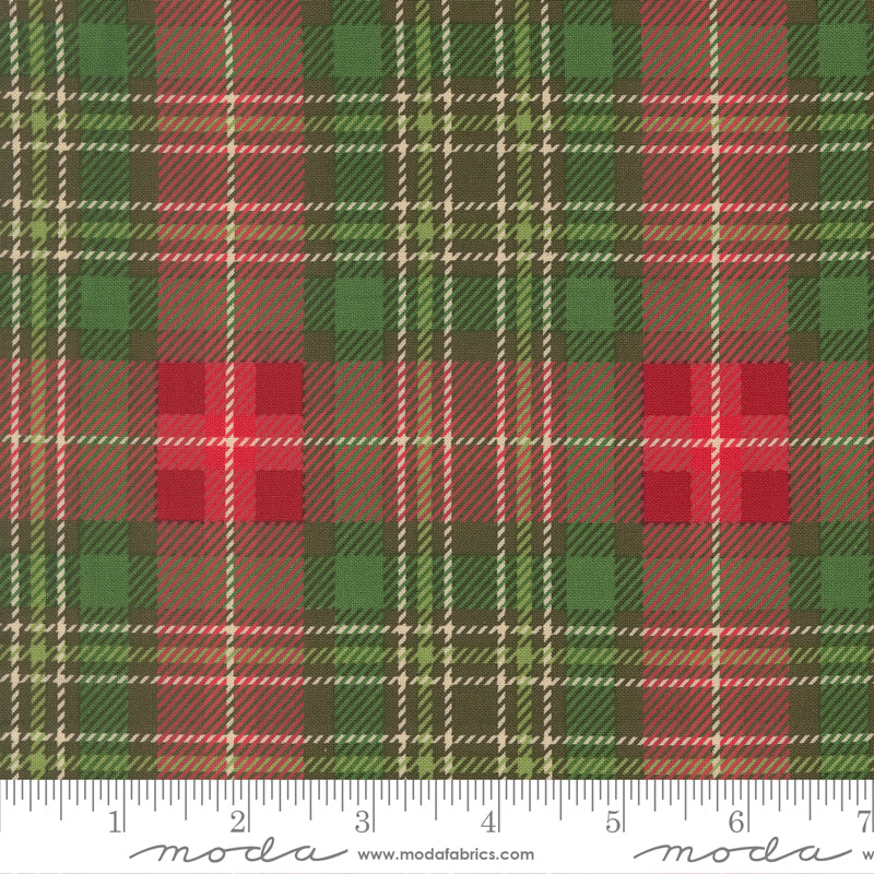 Plaid fabric pattern with red, green, and brown colors, featuring a ruler at the bottom for scale.