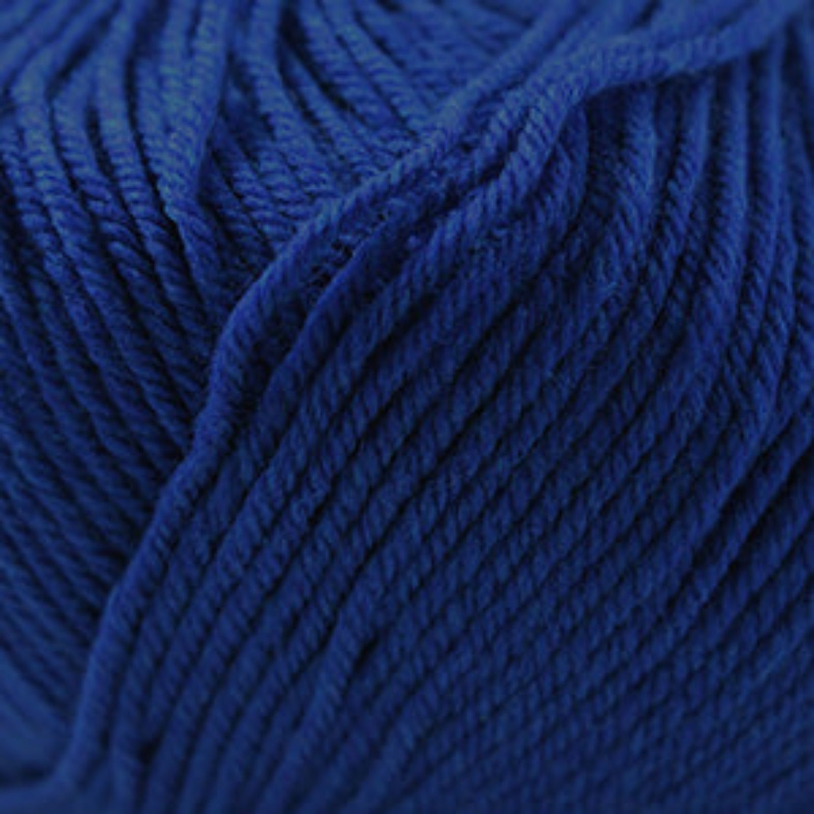 Close-up of blue yarn with a textured surface