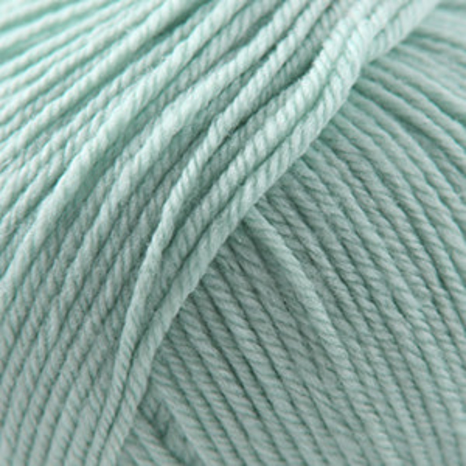 Close-up of light blue yarn strands