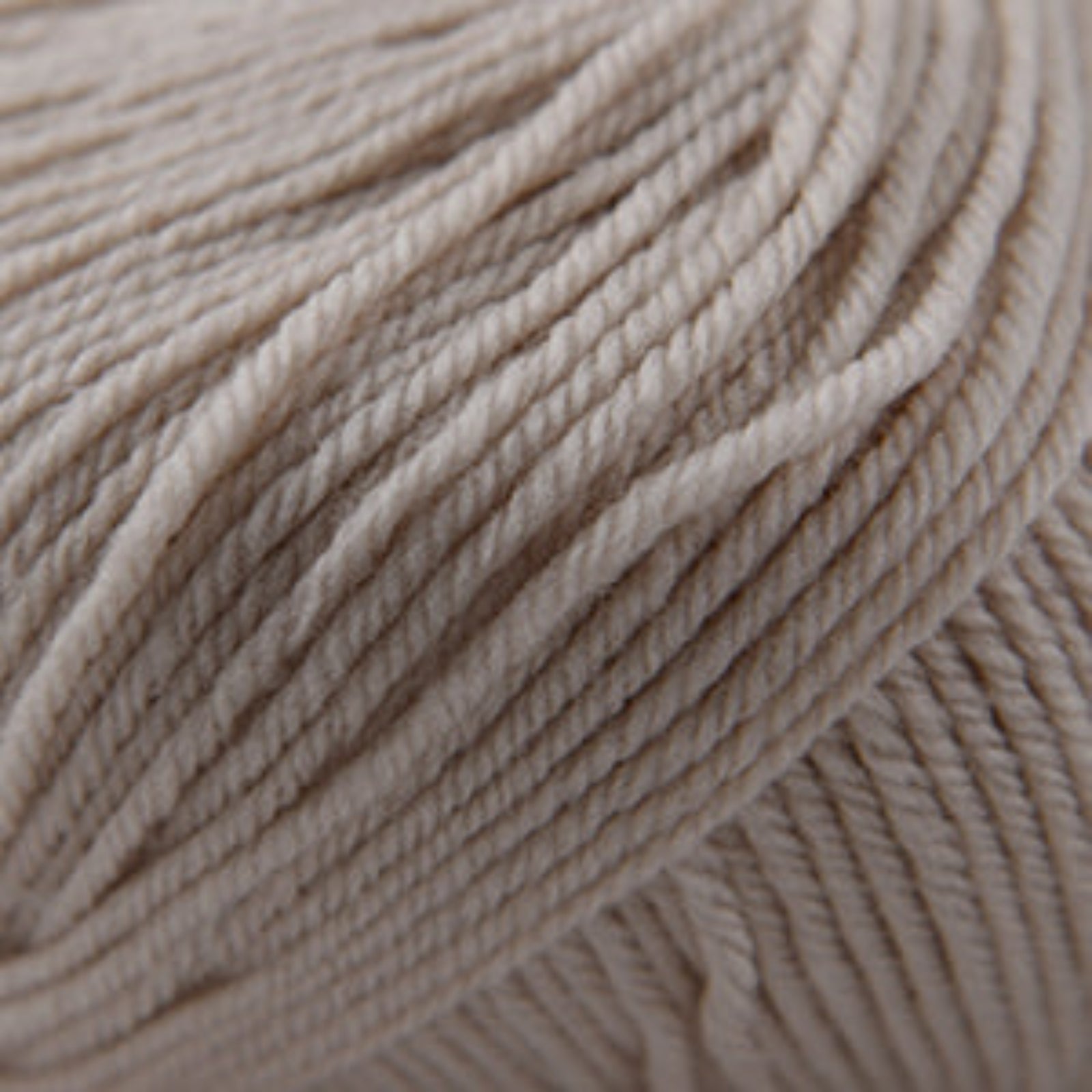 Close-up of a ball of beige yarn