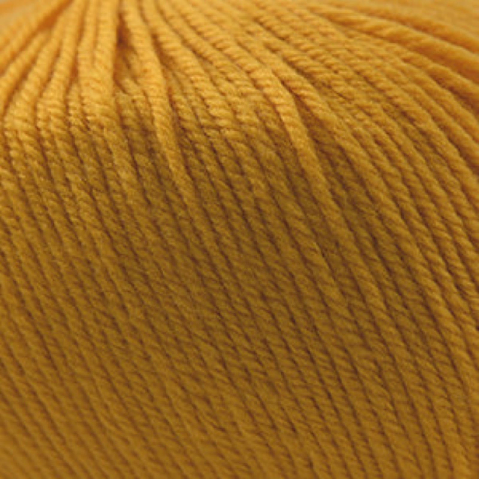 Close-up of a ball of yellow yarn