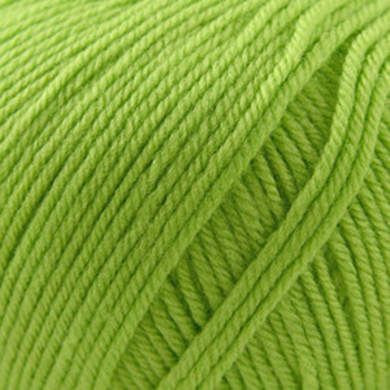 Close-up of green yarn with visible texture