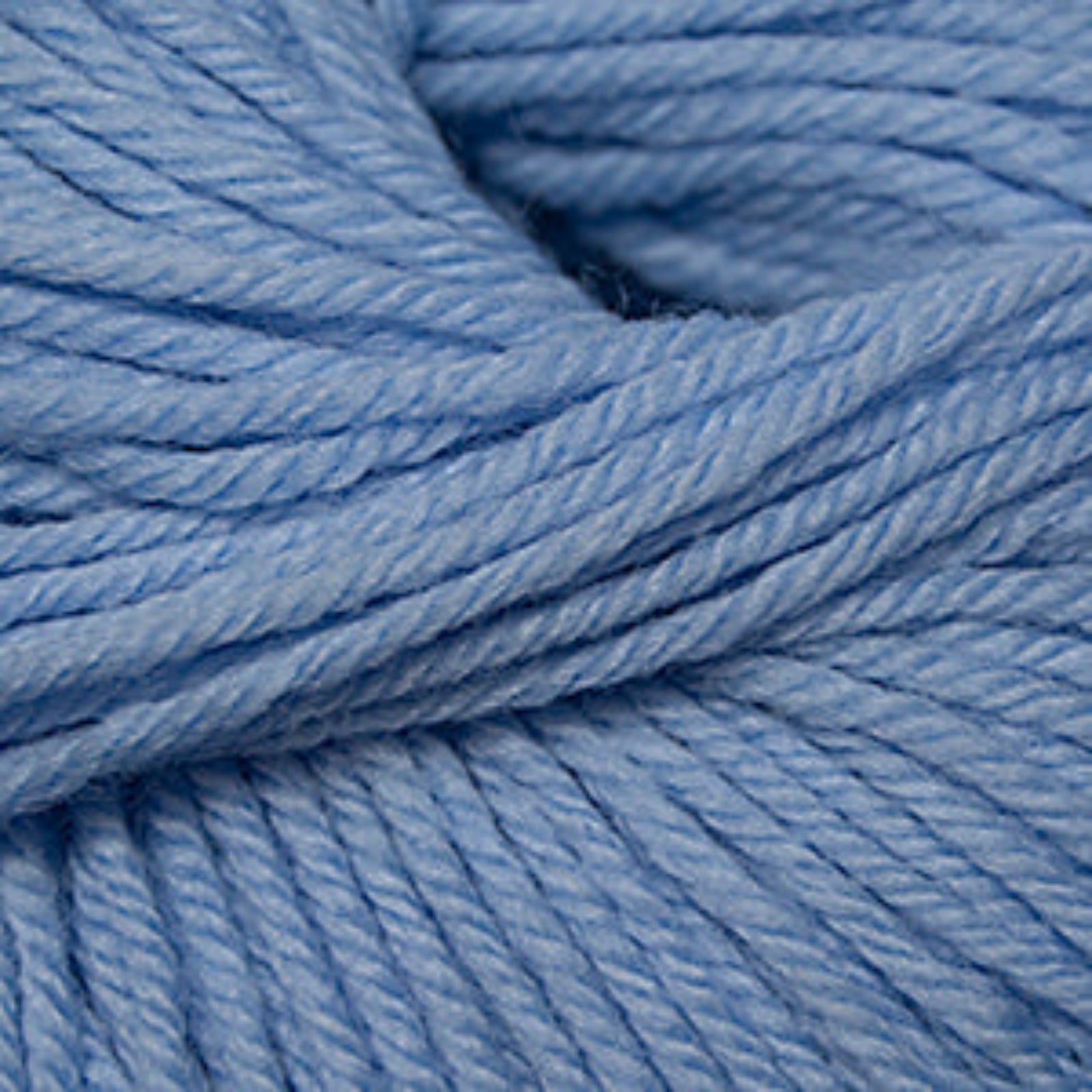 Close-up of blue yarn with a soft focus