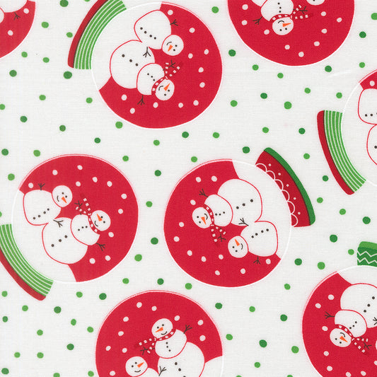 Pattern of snowmen in a snow globe on a white background with green dots.
