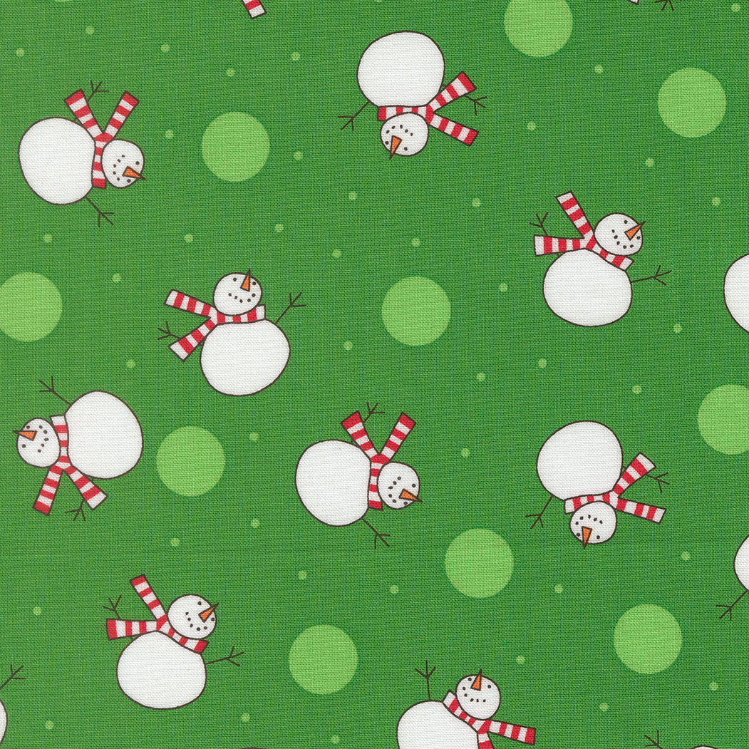 Pattern of snowmen with red scarves on a green background with light green circles.