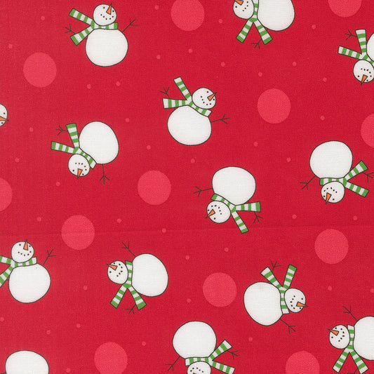 Pattern of snowmen with green scarves on a red background with pink circles.