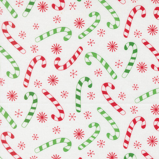Pattern of red and green candy canes with red snowflakes on a white background
