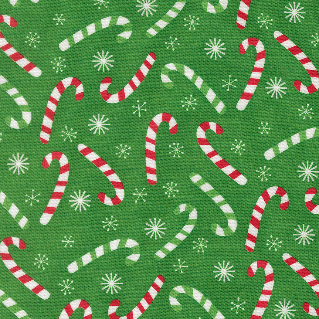 Pattern of candy canes and snowflakes on a green background