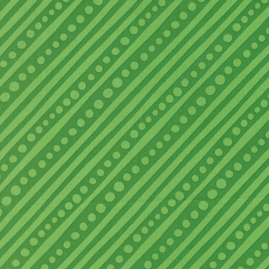 Green pattern with diagonal stripes and small dots on a green background