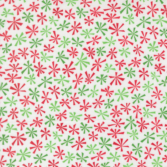 Pattern of red and green stars on a white background