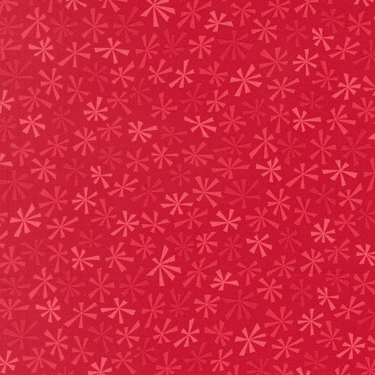 Red pattern with pink geometric shapes on a red background