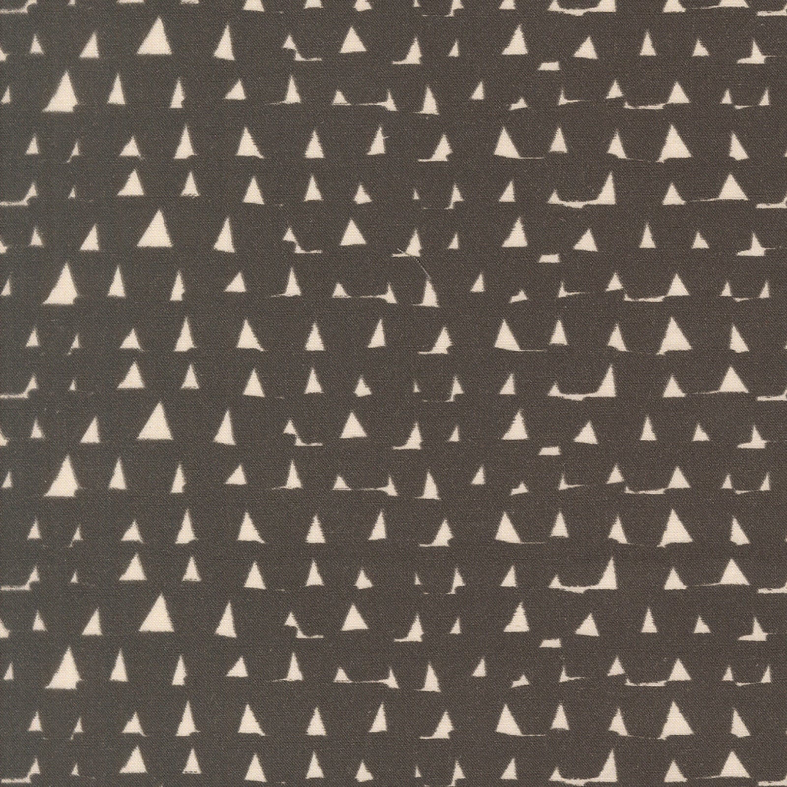 A close-up of a repeating geometric pattern featuring small cream-colored triangles on a dark charcoal gray background.