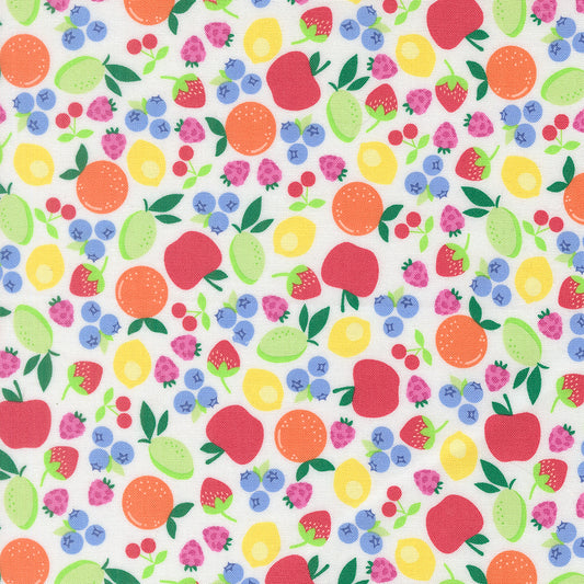 Pattern of colorful fruits and berries on a white background