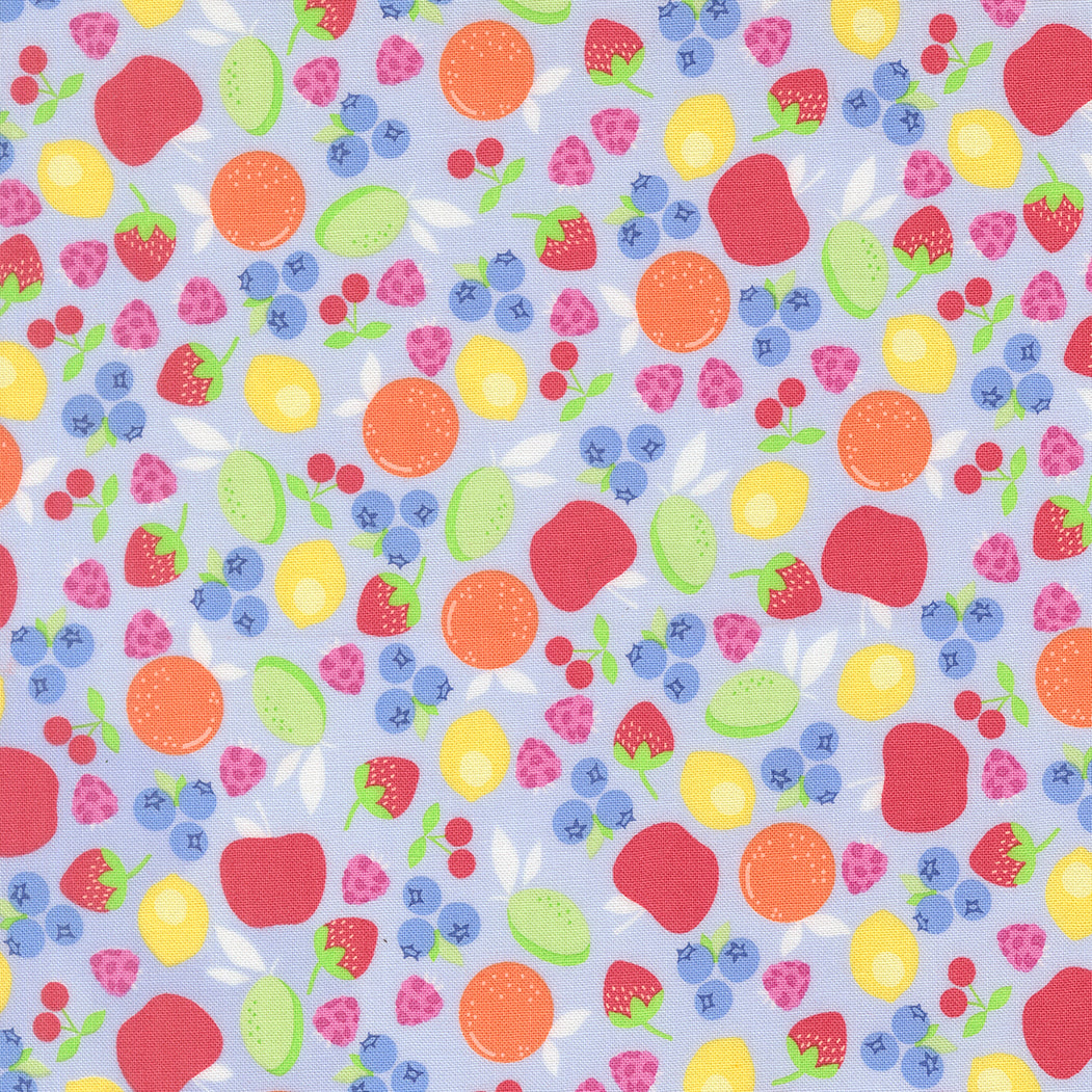 Pattern of colorful fruits and berries on a light blue background