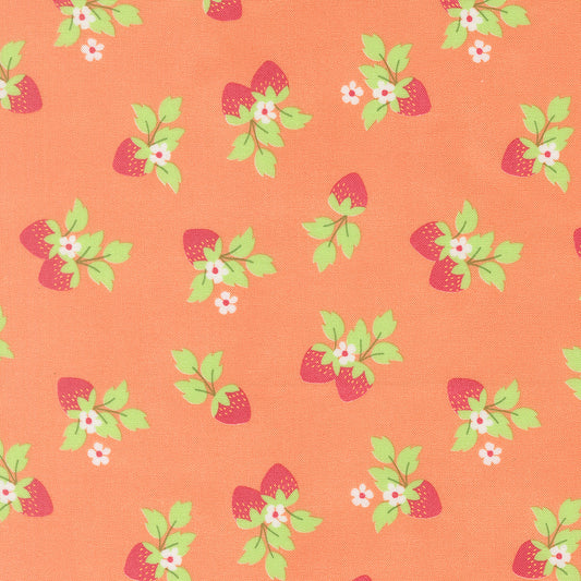 Pattern of strawberries with green leaves on a peach background