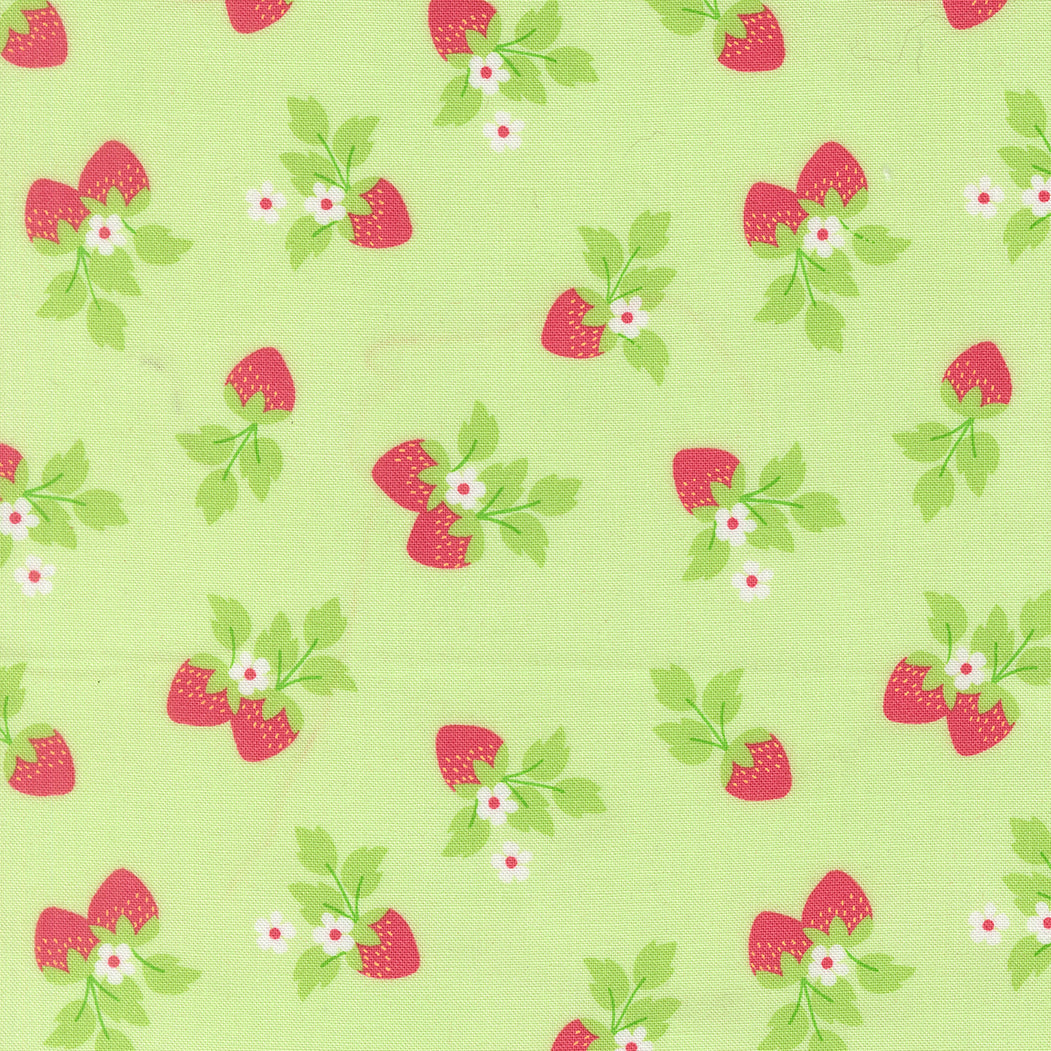Pattern of red strawberries with green leaves on a light green background