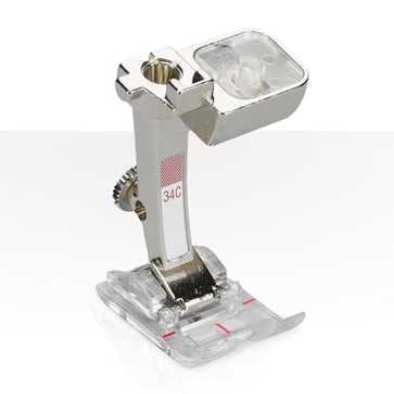 Sewing machine foot with clear plastic cover on a white background